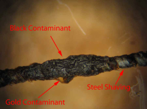 black and gold contaminant