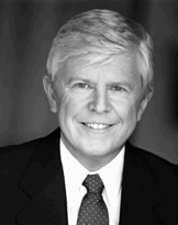 Curtis E.